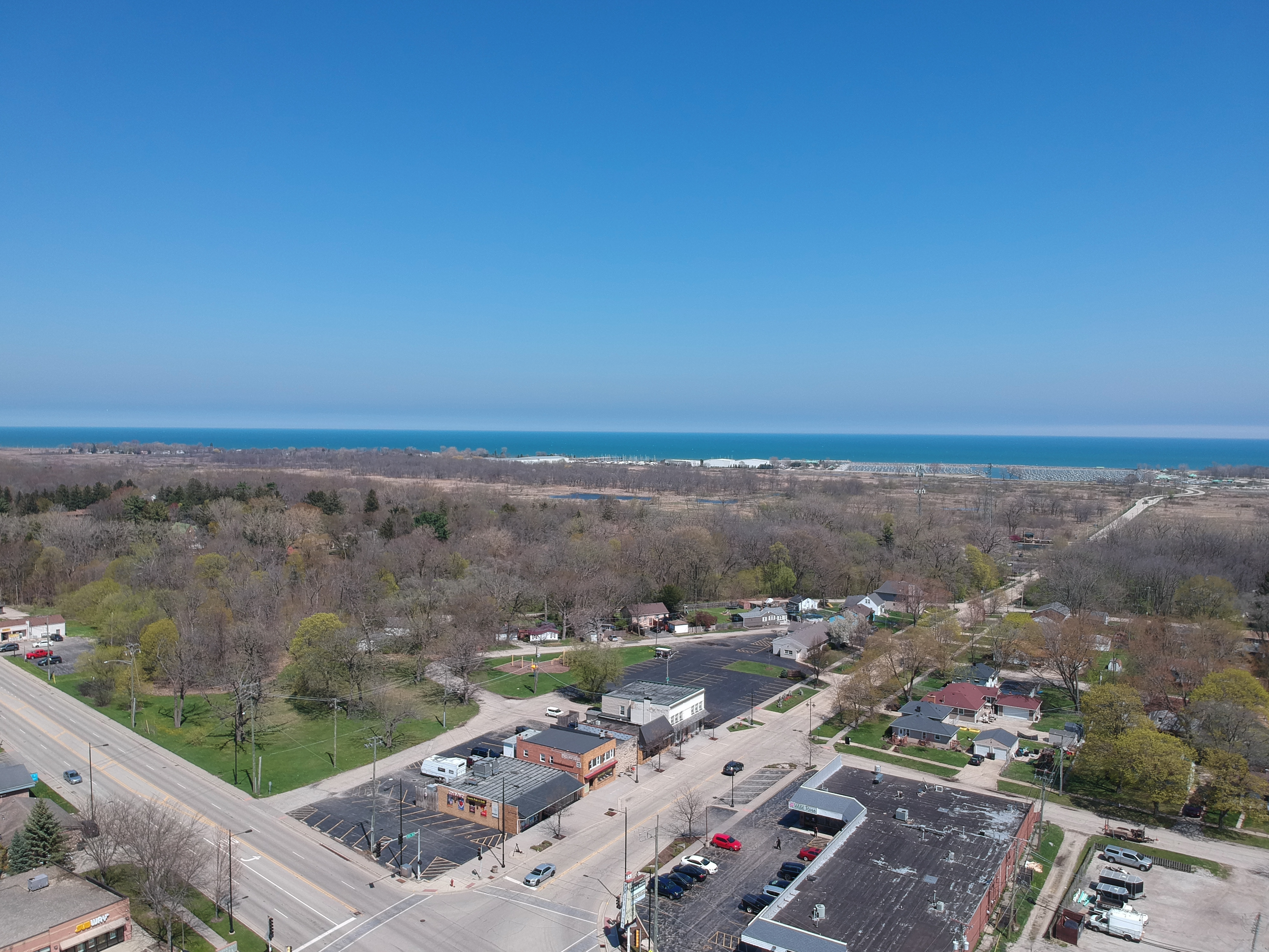 Aerial view of downtown Winthrop Harbor with North Point Marina on Lake Michigan in the distance